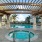 pool and hot tub under pergola