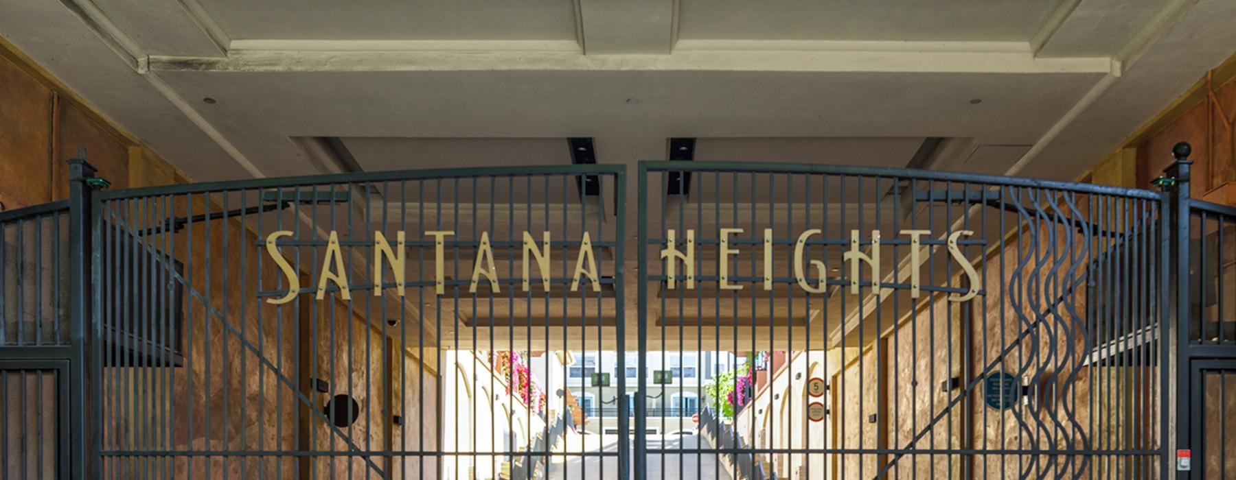 a gate with Santana Heights sign on it